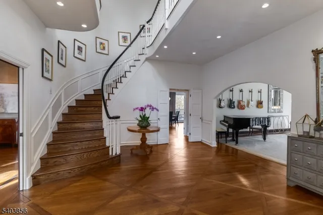 a view of entryway livingroom and hall