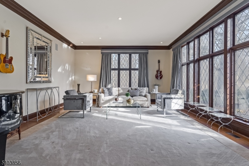 101 Sunny Branch Road Far Hills, NJ 07931 - Photo 7 of 35 a living room with furniture and large windows