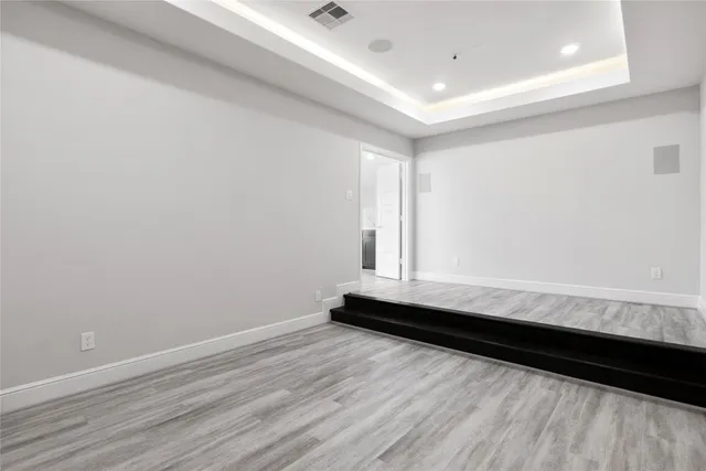 a view of wooden floor and barn in a room