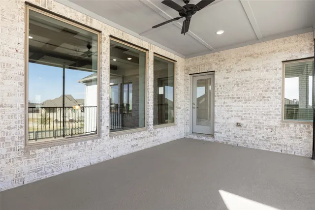 a view of a room with a large window