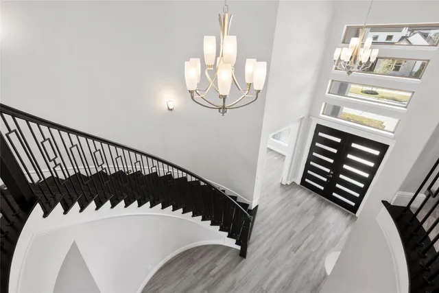 a view of entryway with wooden floor