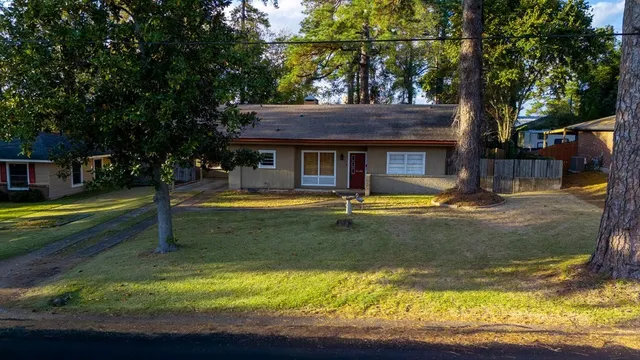 a view of swimming pool with tree s