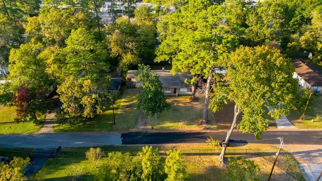 a view of swimming pool with a yard