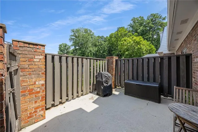 a backyard of a house with wooden floor
