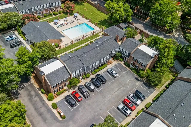 an aerial view of a house with outdoor space