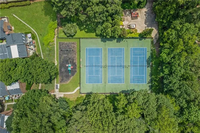 an aerial view of a house having yard