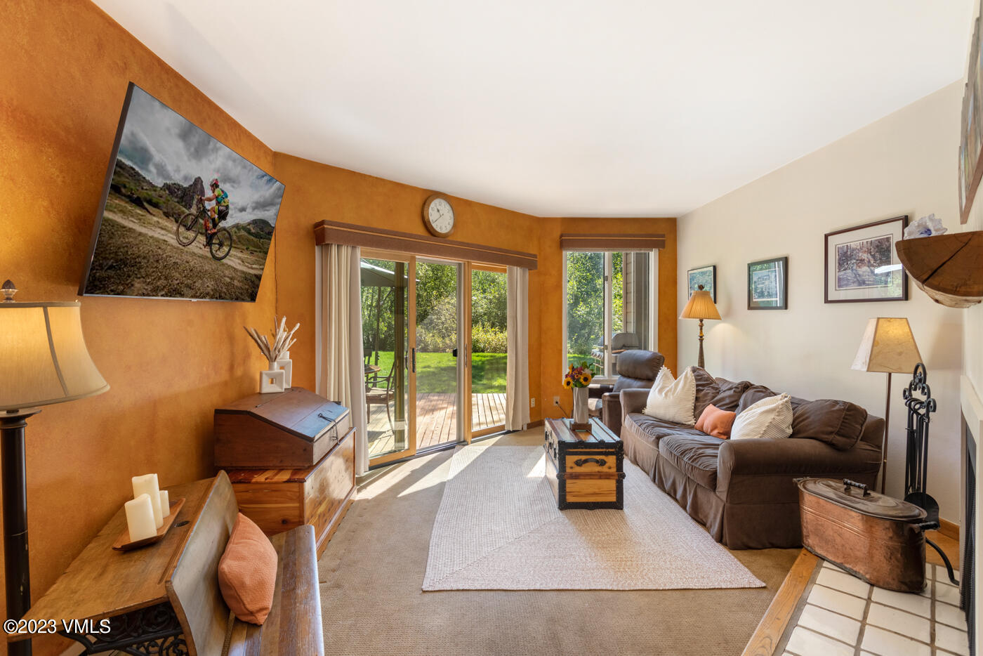 945 Red Sandstone Road, Unit B3 Vail, CO 81657 - Photo 1 of 48 a living room with furniture and a floor to ceiling window