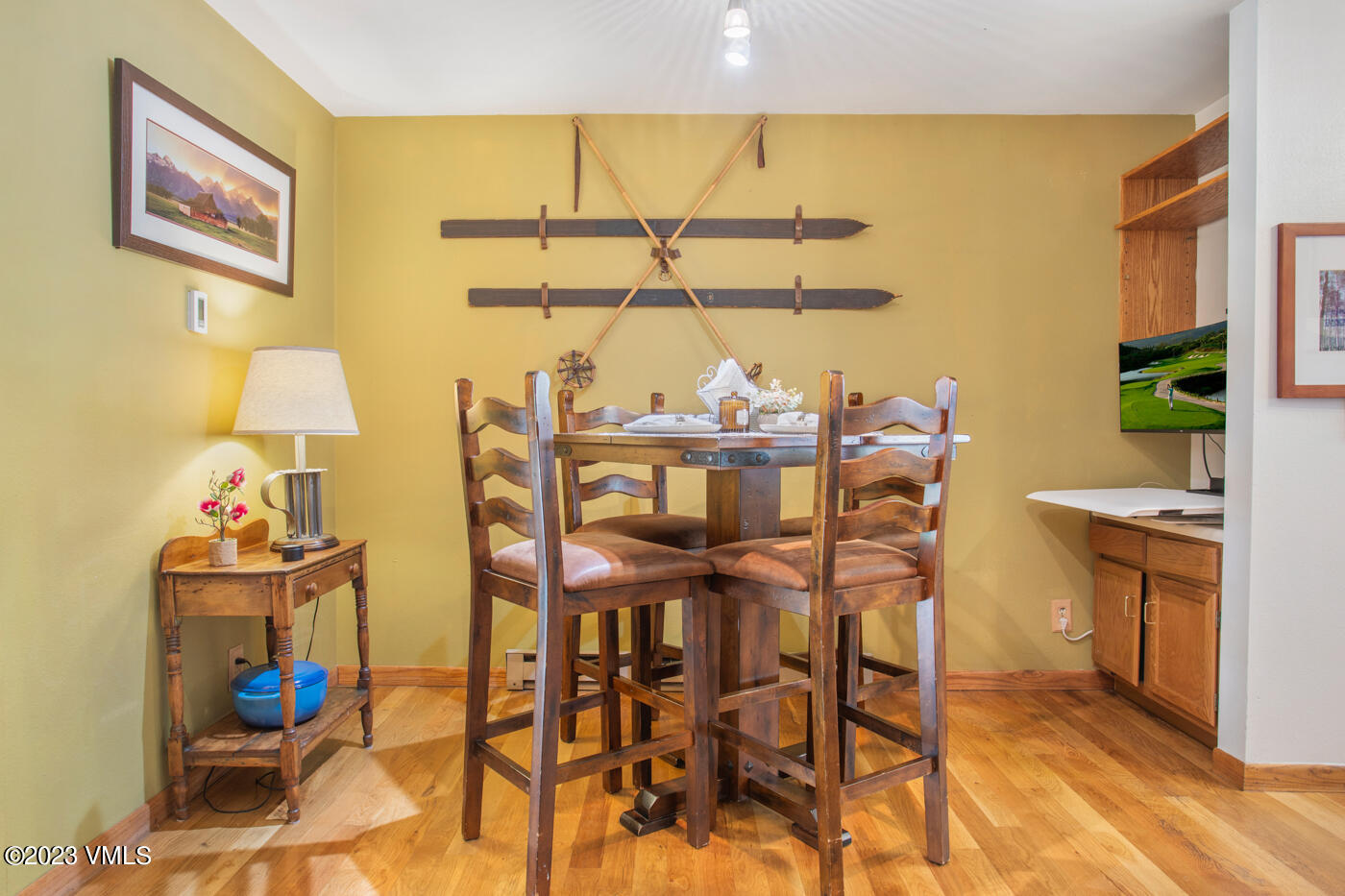 945 Red Sandstone Road, Unit B3 Vail, CO 81657 - Photo 14 of 48 a view of a dining room with furniture and chandelier