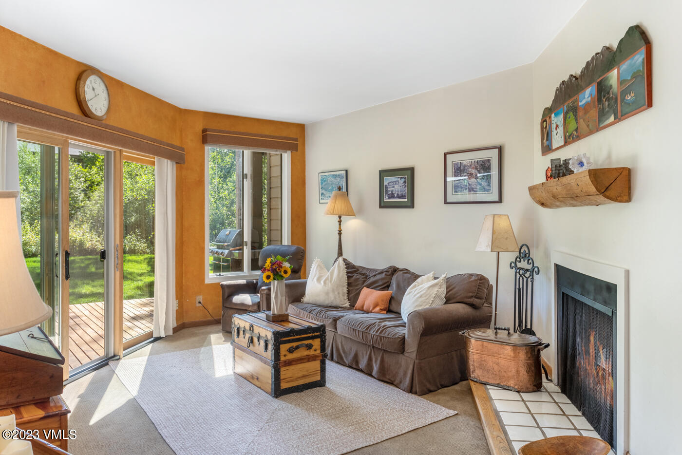 945 Red Sandstone Road, Unit B3 Vail, CO 81657 - Photo 16 of 48 a living room with furniture and a fireplace