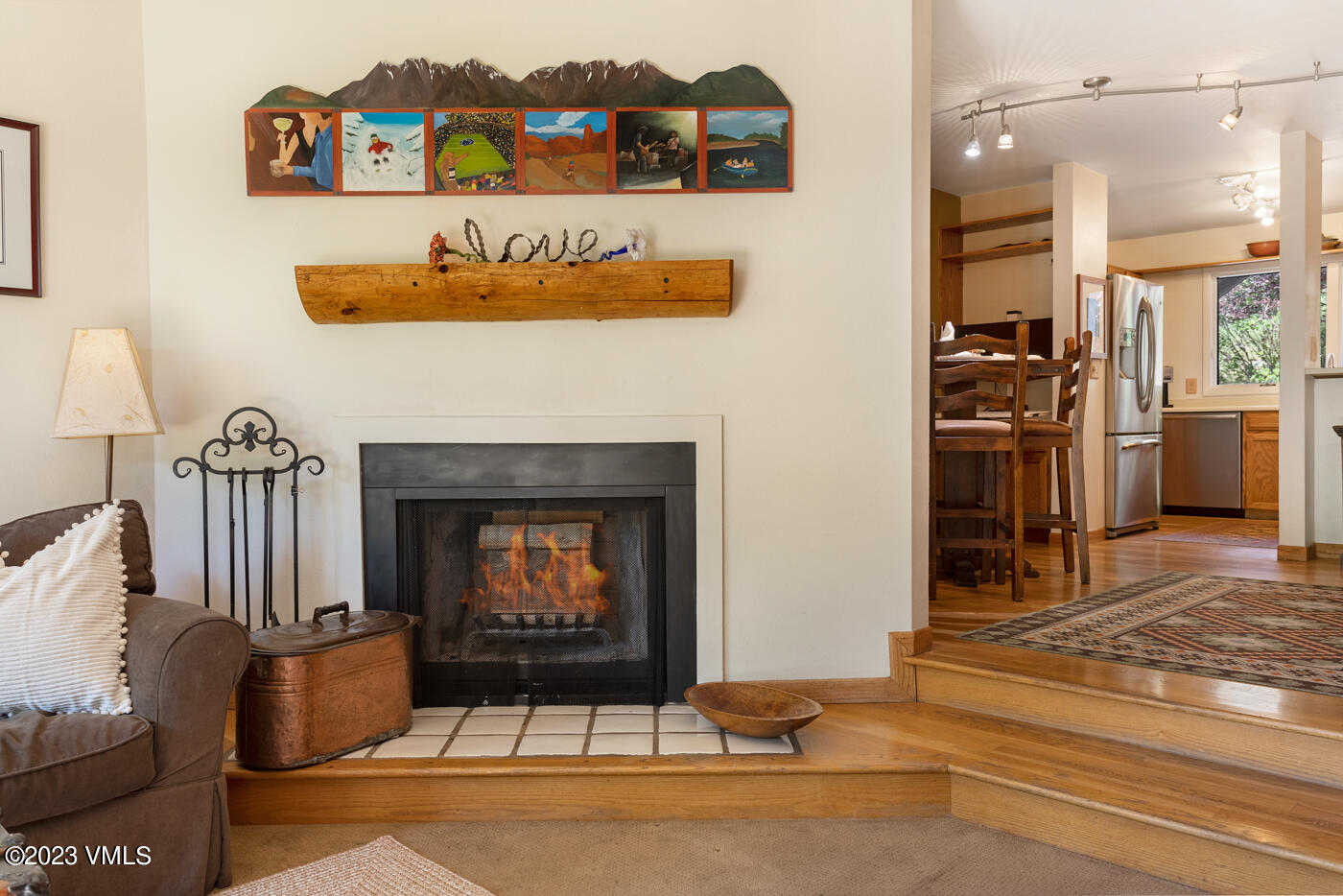 945 Red Sandstone Road, Unit B3 Vail, CO 81657 - Photo 18 of 48 a living room with furniture and a fireplace