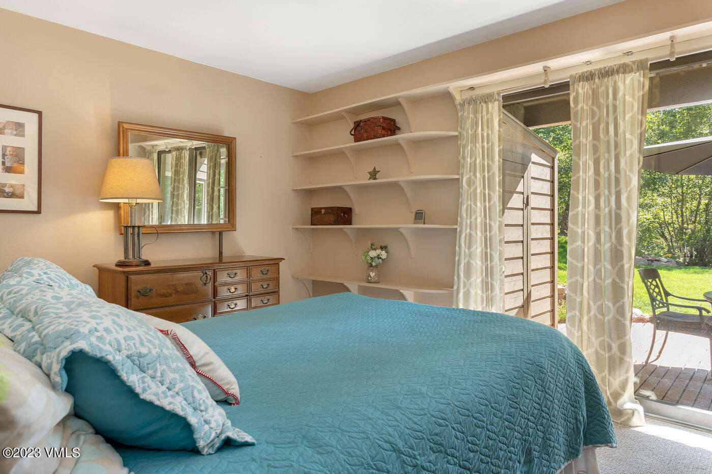 945 Red Sandstone Road, Unit B3 Vail, CO 81657 - Photo 22 of 48 a bedroom with a large bed and a window