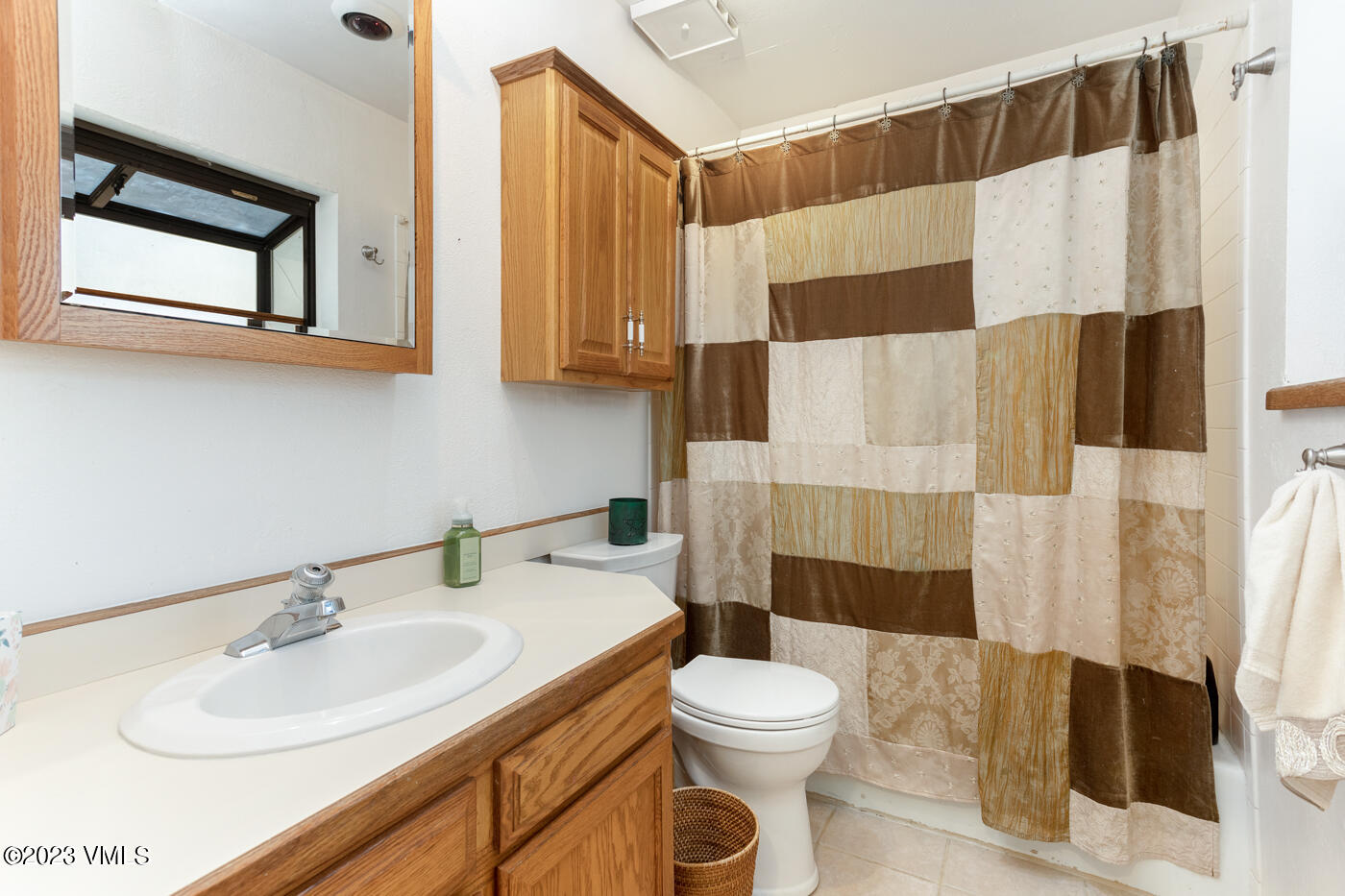 945 Red Sandstone Road, Unit B3 Vail, CO 81657 - Photo 24 of 48 a bathroom with a sink and a mirror