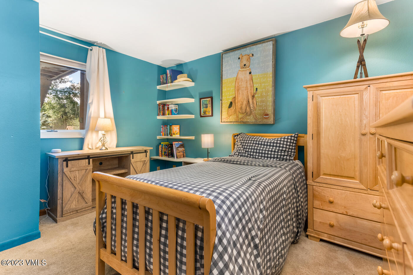 945 Red Sandstone Road, Unit B3 Vail, CO 81657 - Photo 25 of 48 a bedroom with two beds and a window