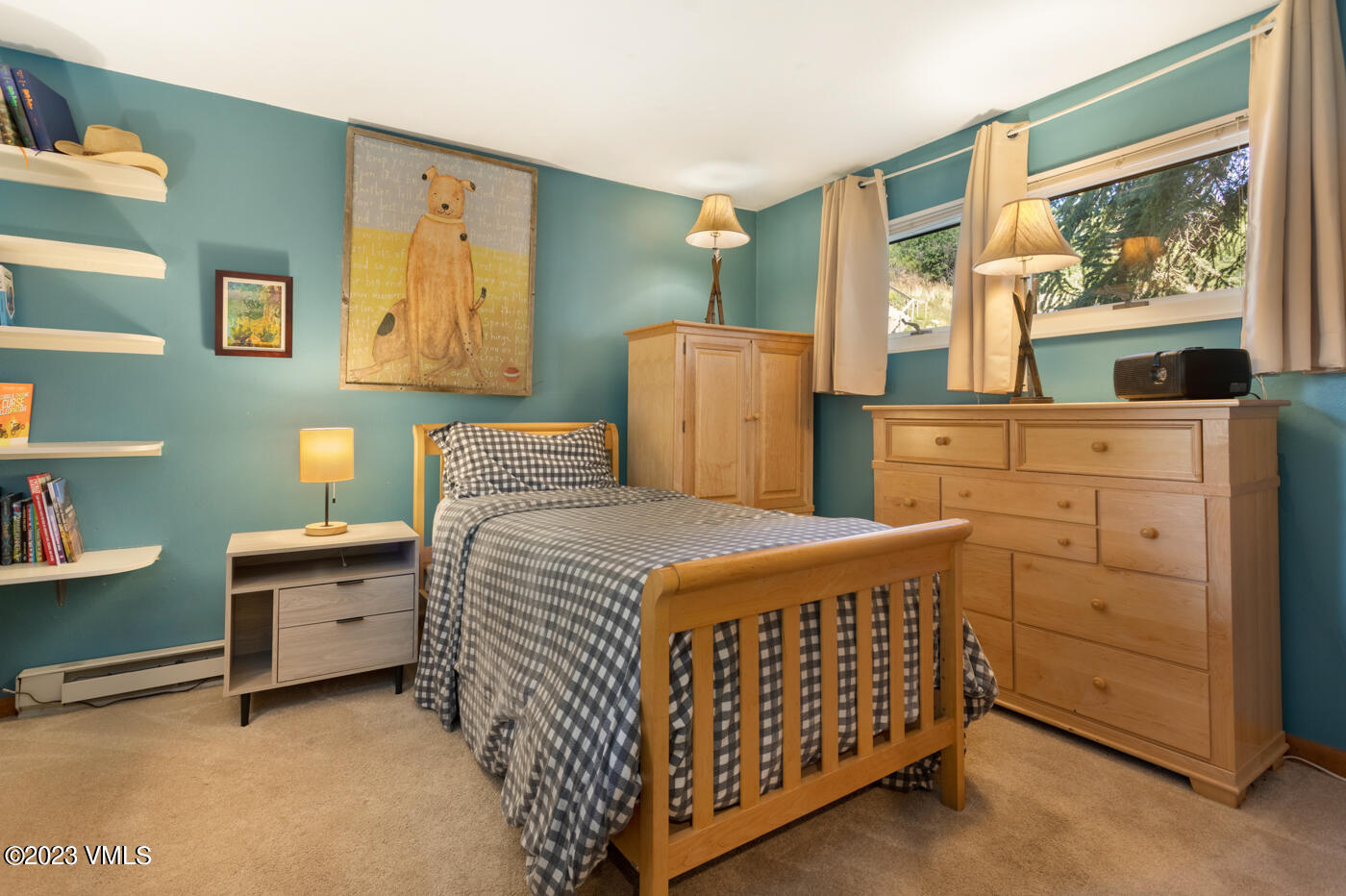 945 Red Sandstone Road, Unit B3 Vail, CO 81657 - Photo 26 of 48 a bedroom with a bed and a dresser