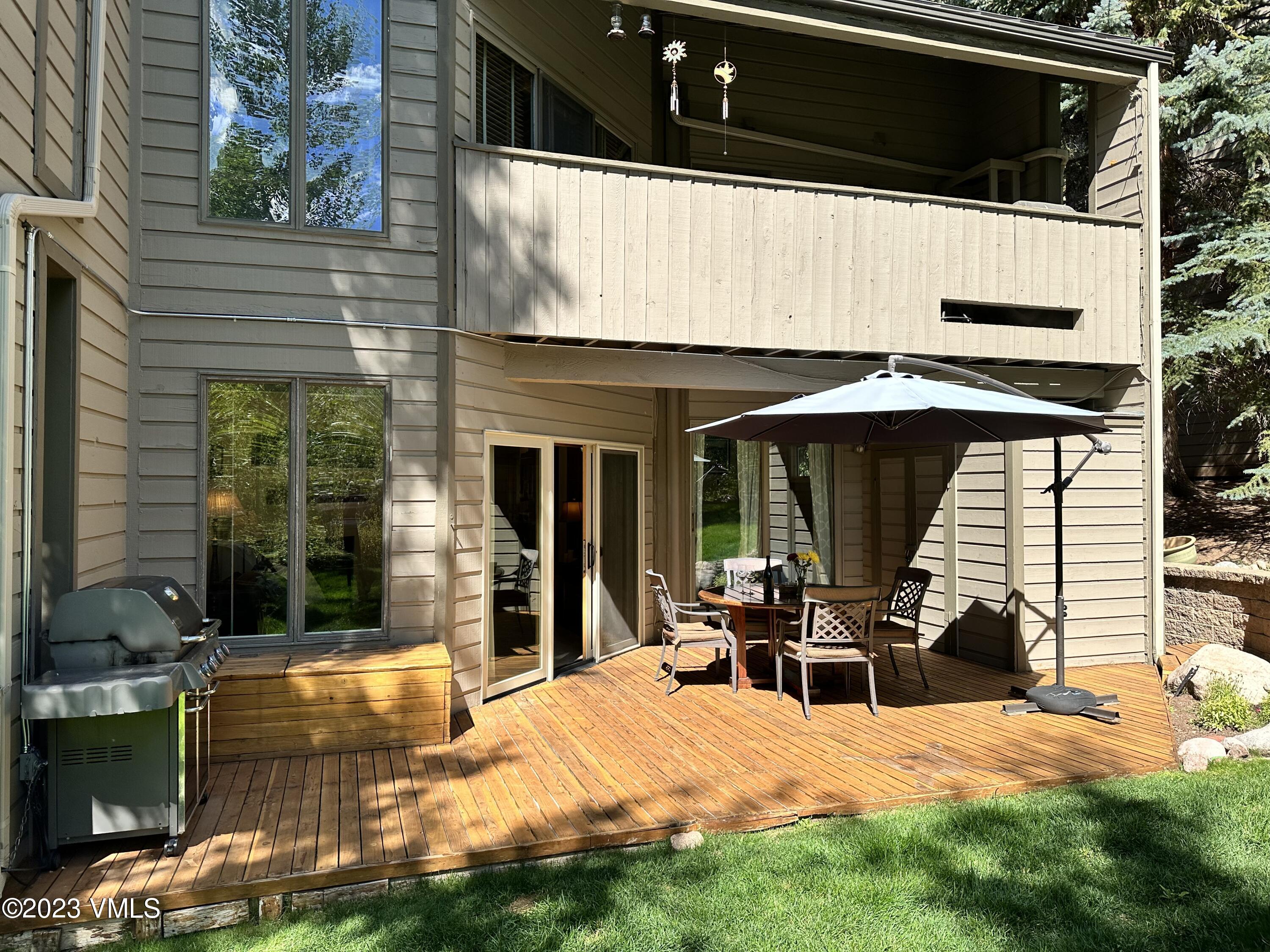 945 Red Sandstone Road, Unit B3 Vail, CO 81657 - Photo 3 of 48 a view of a house with backyard outdoor seating area and furniture
