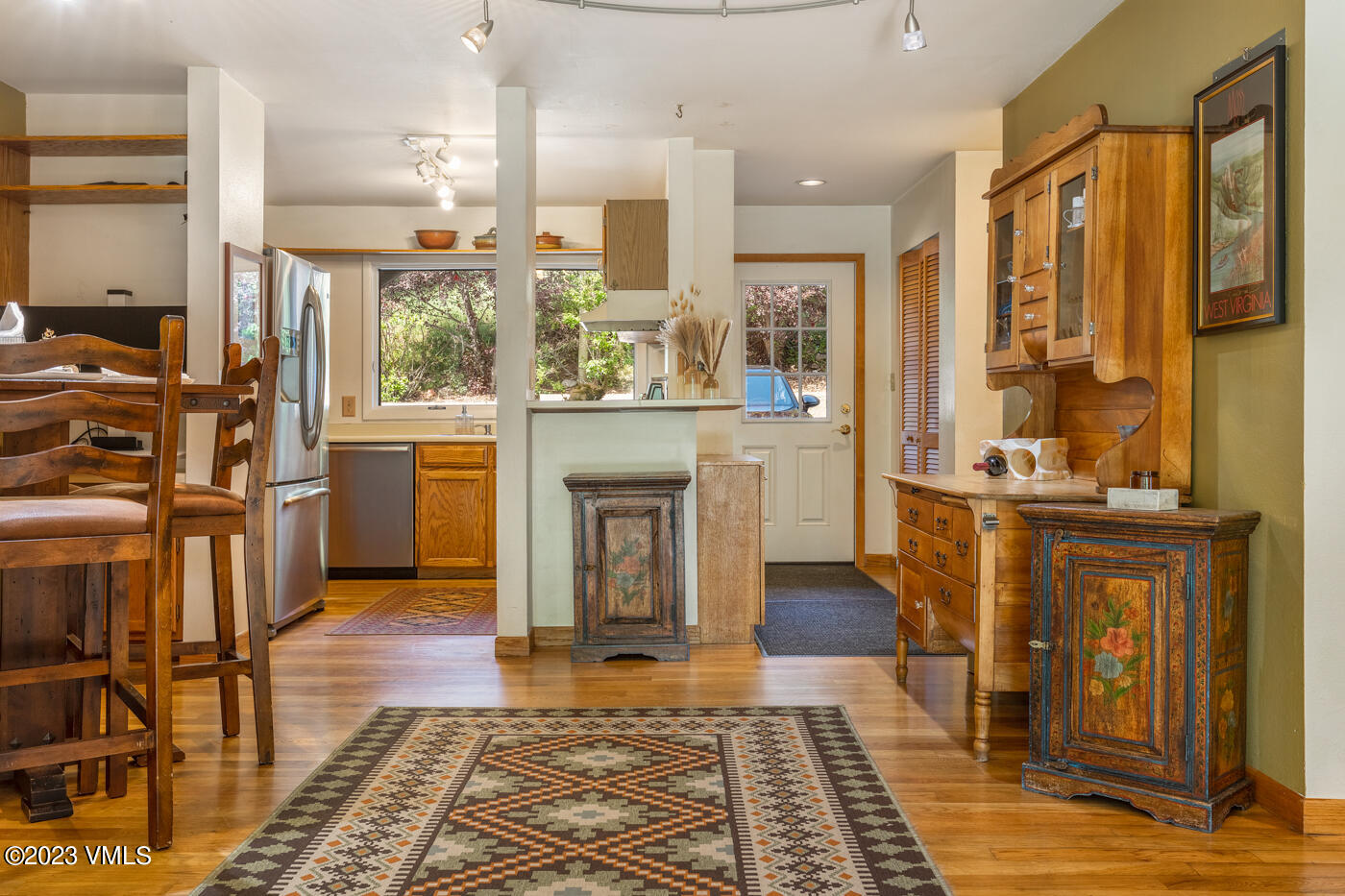 945 Red Sandstone Road, Unit B3 Vail, CO 81657 - Photo 4 of 48 a open kitchen with sink and cabinets