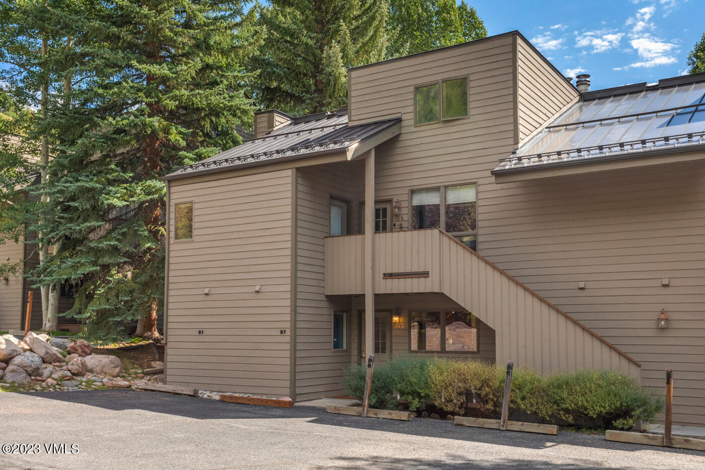 945 Red Sandstone Road, Unit B3 Vail, CO 81657 - Photo 45 of 48 a view of a house with a patio