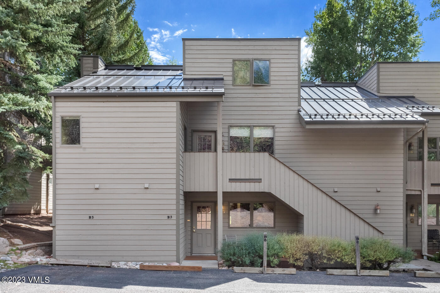 945 Red Sandstone Road, Unit B3 Vail, CO 81657 - Photo 47 of 48 a view of a house with a garage