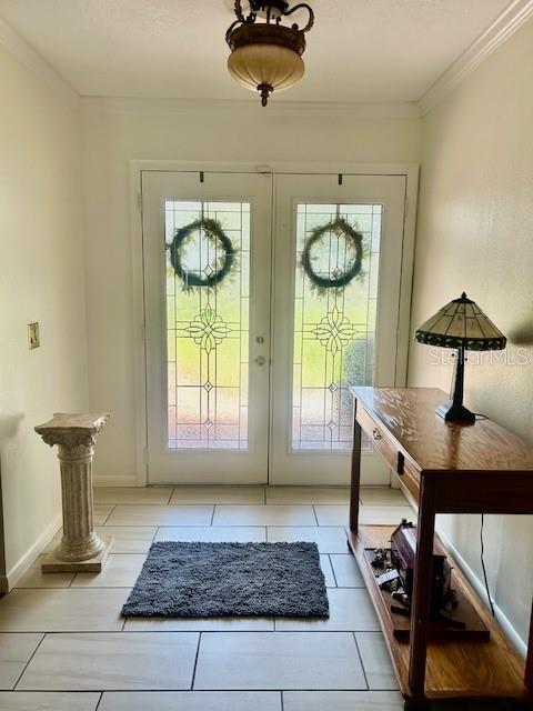 2935 Plantation Road Winter Haven, FL 33884 - Photo 2 of 32 a view of a hallway with furniture and chandelier