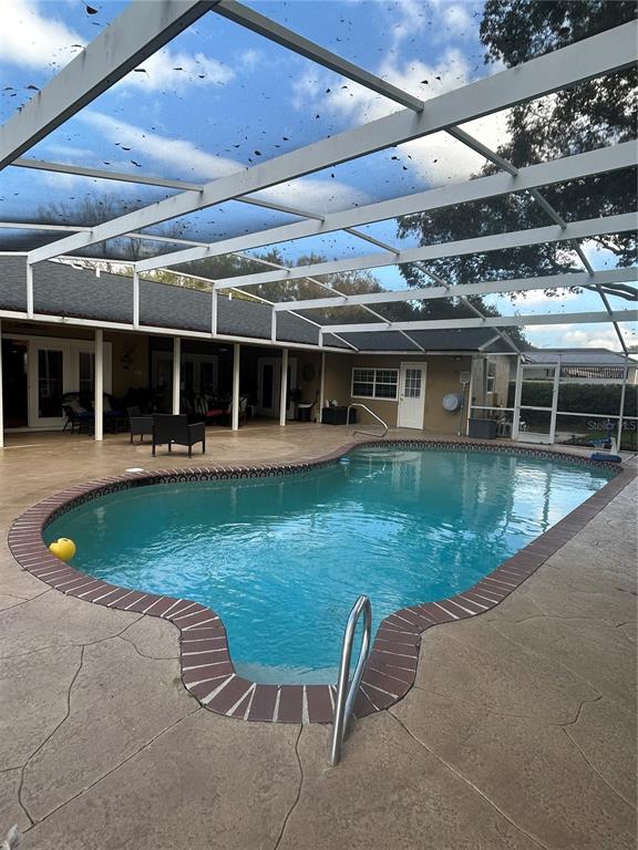 2935 Plantation Road Winter Haven, FL 33884 - Photo 26 of 32 an outdoor view with a swimming pool