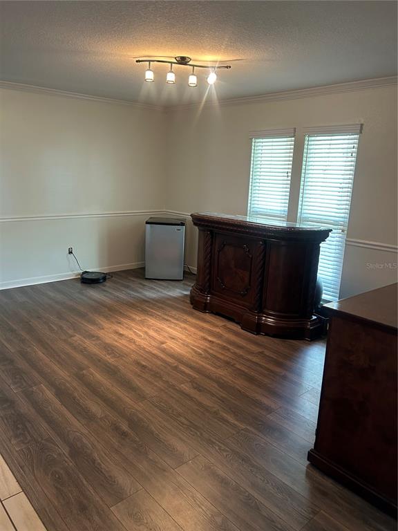 2935 Plantation Road Winter Haven, FL 33884 - Photo 5 of 32 a view of empty room with wooden floor