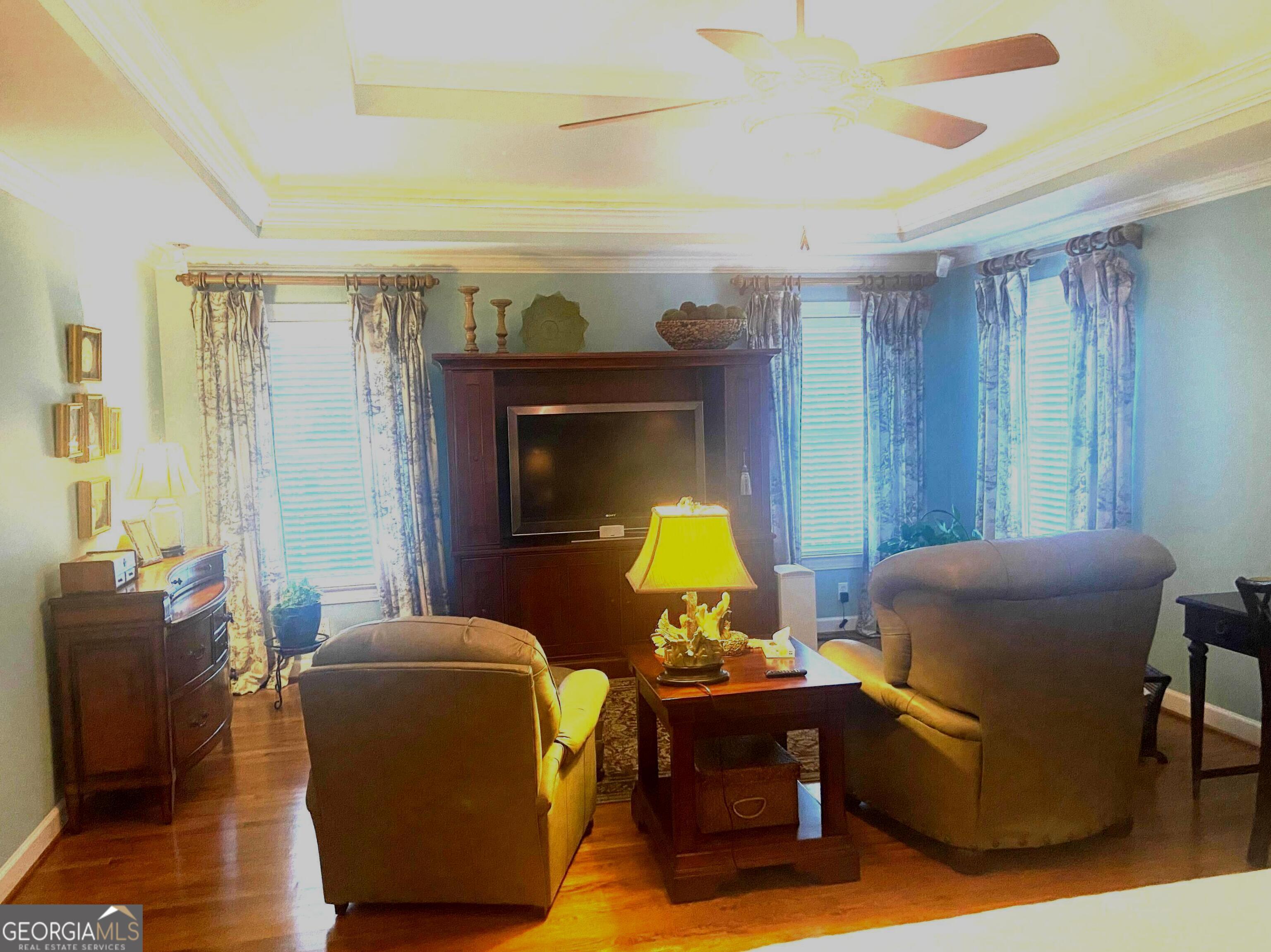 100 Valley Brook Drive Rome, GA 30161 - Photo 16 of 26 Main level master bedroom with sitting room. Trey ceiling with excellent lighting. Boze sound system for entire house will remain. The en-suite bath is beautifully appointed. The walk-in closet is excellent.