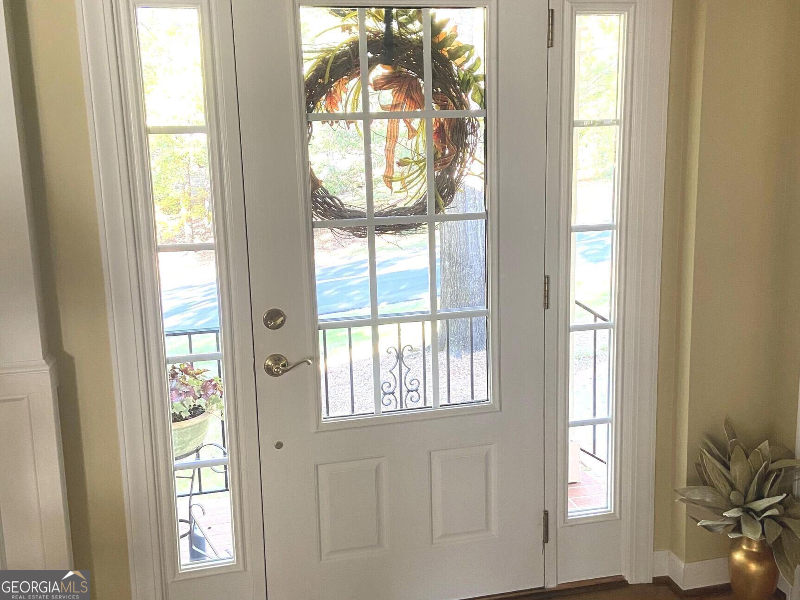100 Valley Brook Drive Rome, GA 30161 - Photo 2 of 26 WELCOMING ENTRY SHOWS THE UPDATES WITH THE BEAUTIFUL HARDWOODS WHICH CONTINUE THROUGH THE MAIN LEVEL AND THE UPSTAIRS.