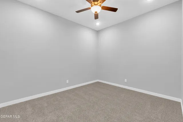 a large kitchen with stainless steel appliances granite countertop a large counter top and stove