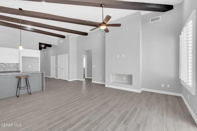 a bathroom with a toilet and bathtub