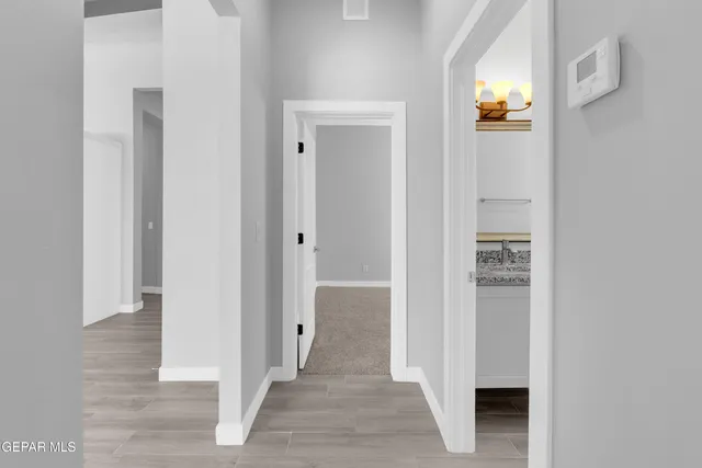 a view of a house with a snow in the yard