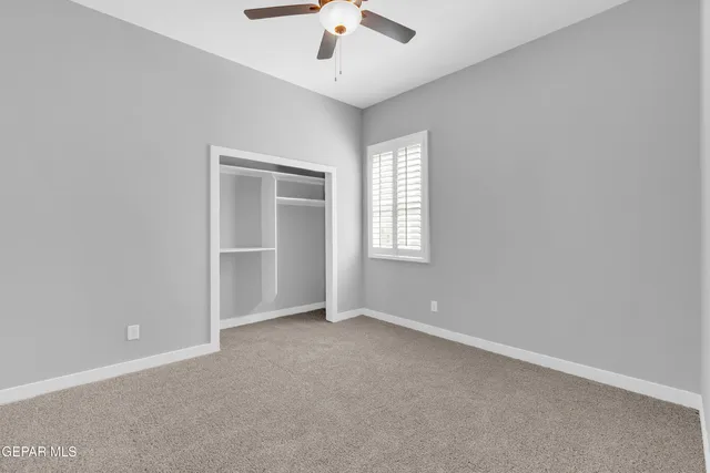 a view of a building with a snow in the background