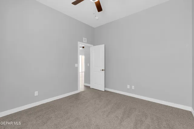 a view of a living room with a large window
