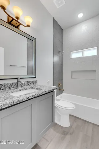 a view of a dinning table and chairs in the patio