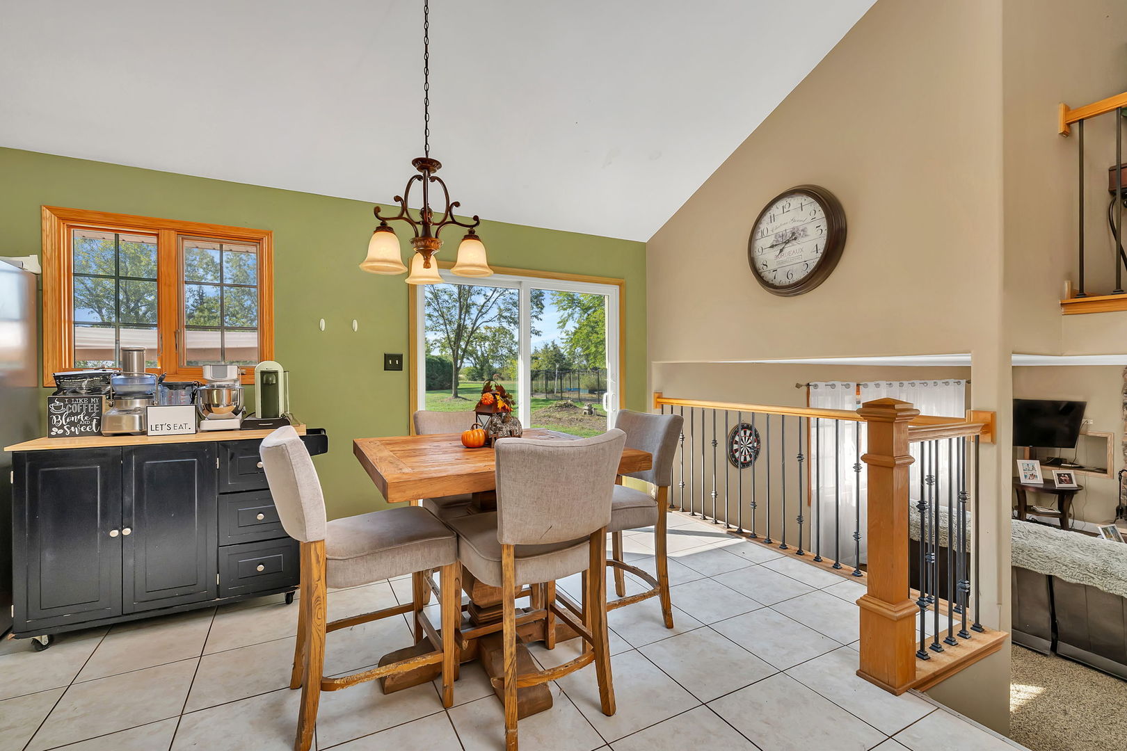9417 West Steger Road Frankfort, IL 60423 - Photo 11 of 52 a dining room with furniture and window
