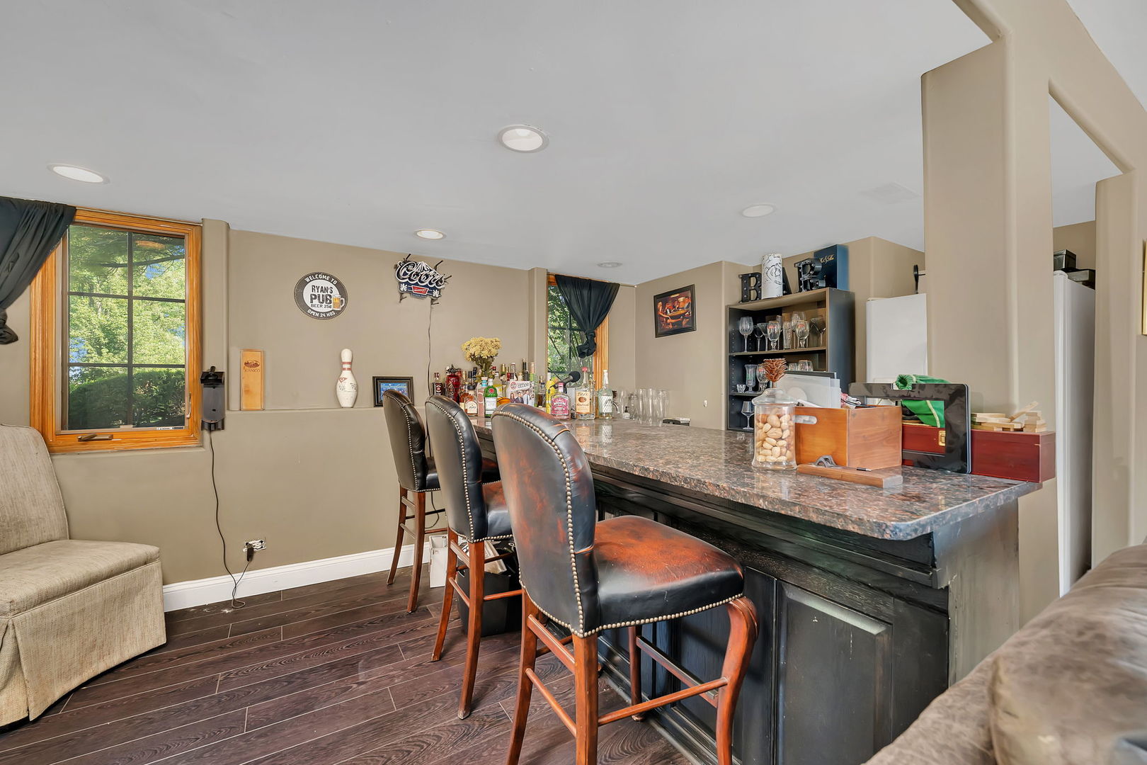 9417 West Steger Road Frankfort, IL 60423 - Photo 26 of 52 a dining room with furniture and wooden floor