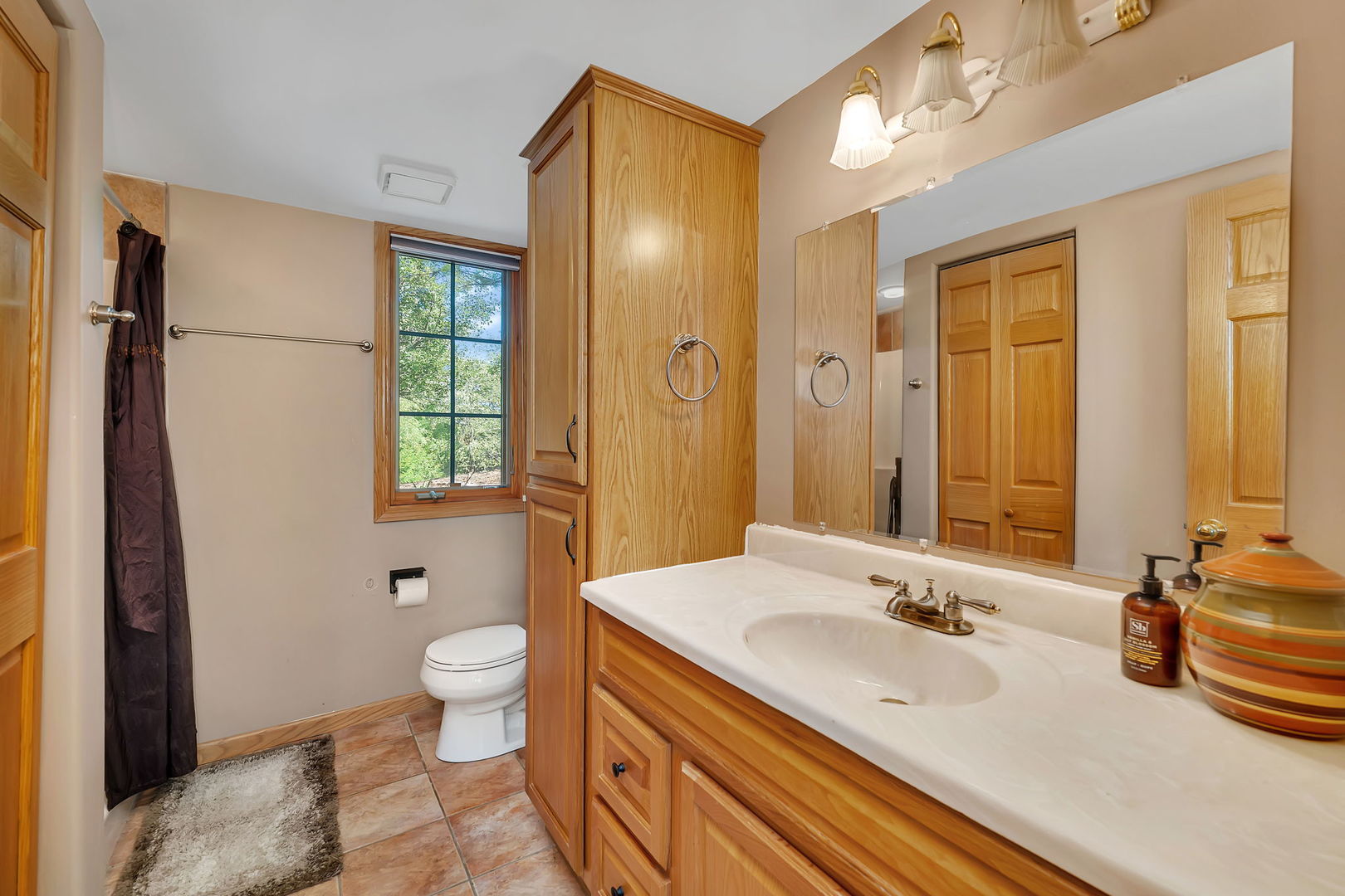 9417 West Steger Road Frankfort, IL 60423 - Photo 27 of 52 a bathroom with a granite countertop sink toilet and shower