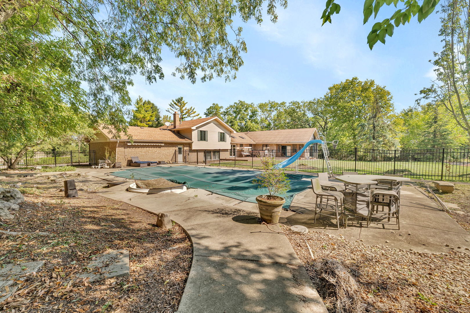 9417 West Steger Road Frankfort, IL 60423 - Photo 30 of 52 a view of a house with backyard and sitting area
