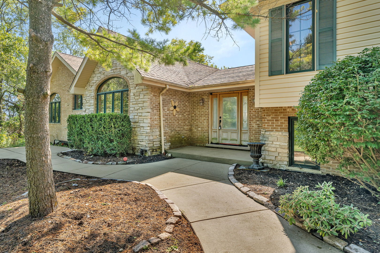 9417 West Steger Road Frankfort, IL 60423 - Photo 3 of 52 a front view of a house