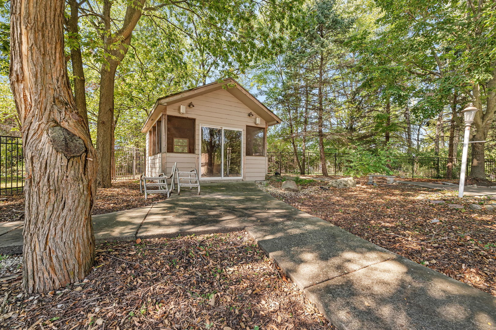 9417 West Steger Road Frankfort, IL 60423 - Photo 32 of 52 a front view of a house with a yard