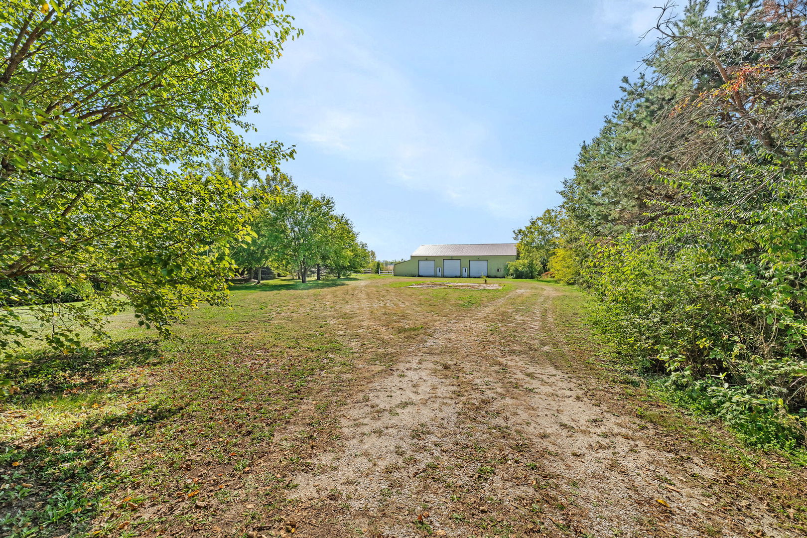 9417 West Steger Road Frankfort, IL 60423 - Photo 38 of 52 a view of a lake with a yard
