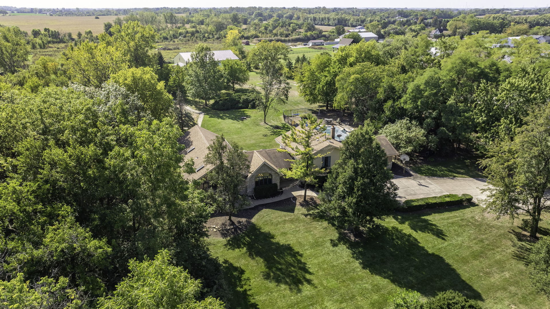 9417 West Steger Road Frankfort, IL 60423 - Photo 42 of 52 an aerial view of residential houses with outdoor space and trees