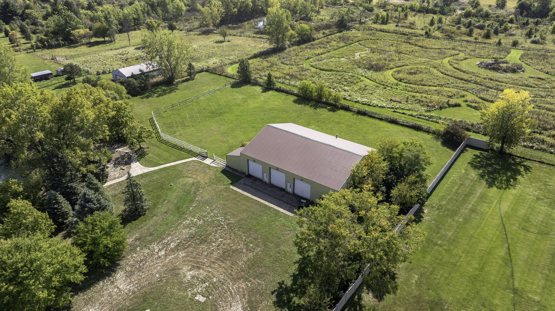 9417 West Steger Road Frankfort, IL 60423 - Photo 44 of 52 an aerial view of residential houses with swimming pool