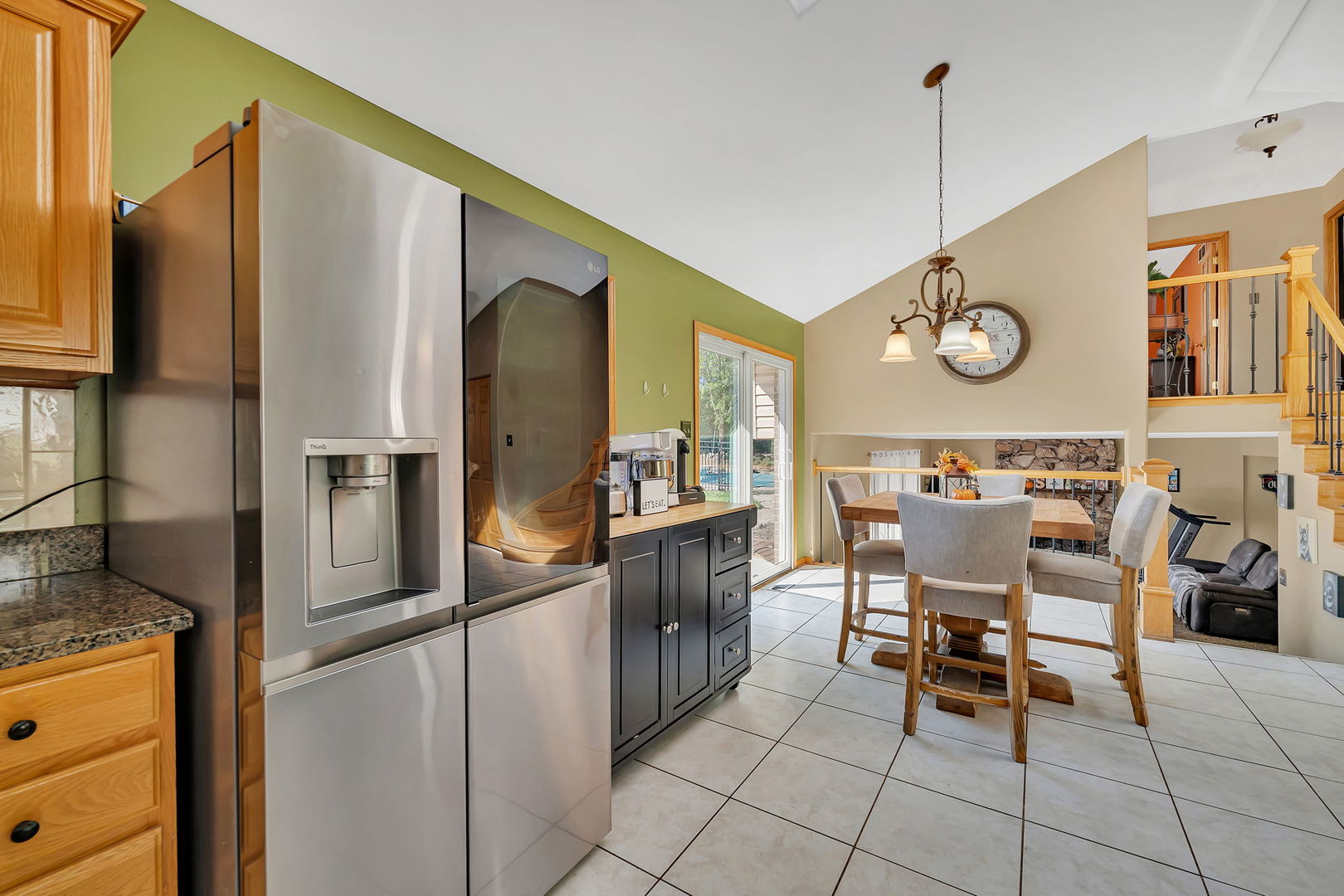 9417 West Steger Road Frankfort, IL 60423 - Photo 8 of 52 a kitchen with stainless steel appliances granite countertop a refrigerator and a stove top oven