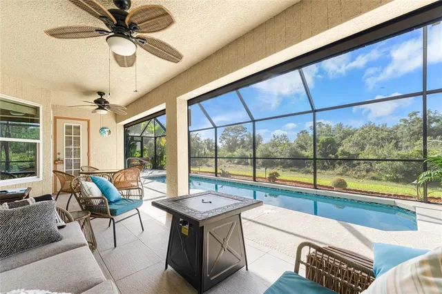 a living room with hardwood floor and furniture