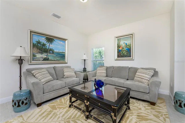 a living room with furniture and a couch