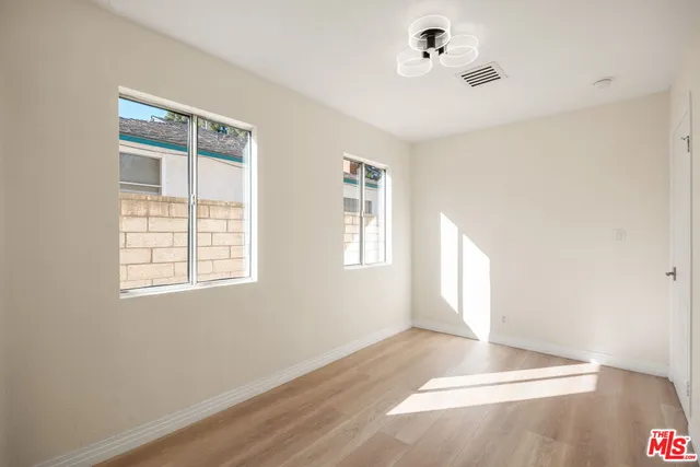 a view of livingroom with hardwood floor and window