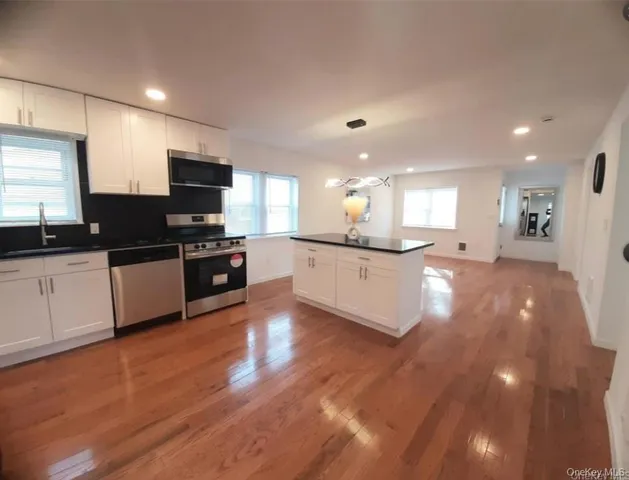 a view of a two chairs in the deck