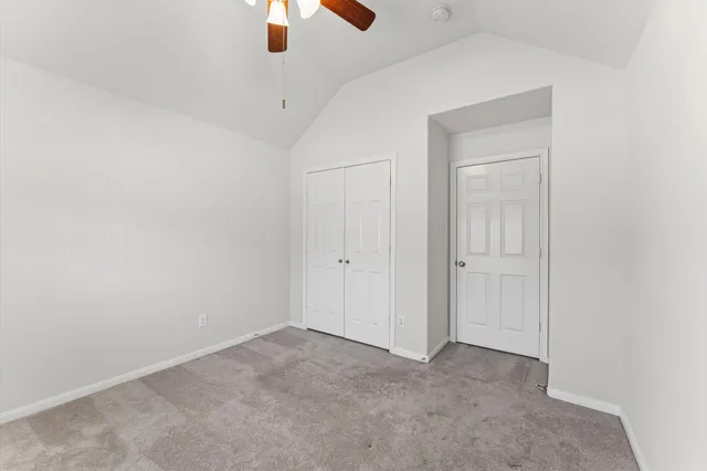 a view of a windows and chandelier in a room