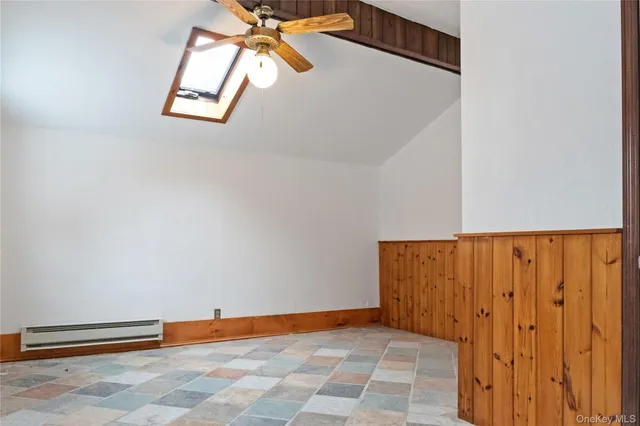 a bathroom with a toilet and a sink