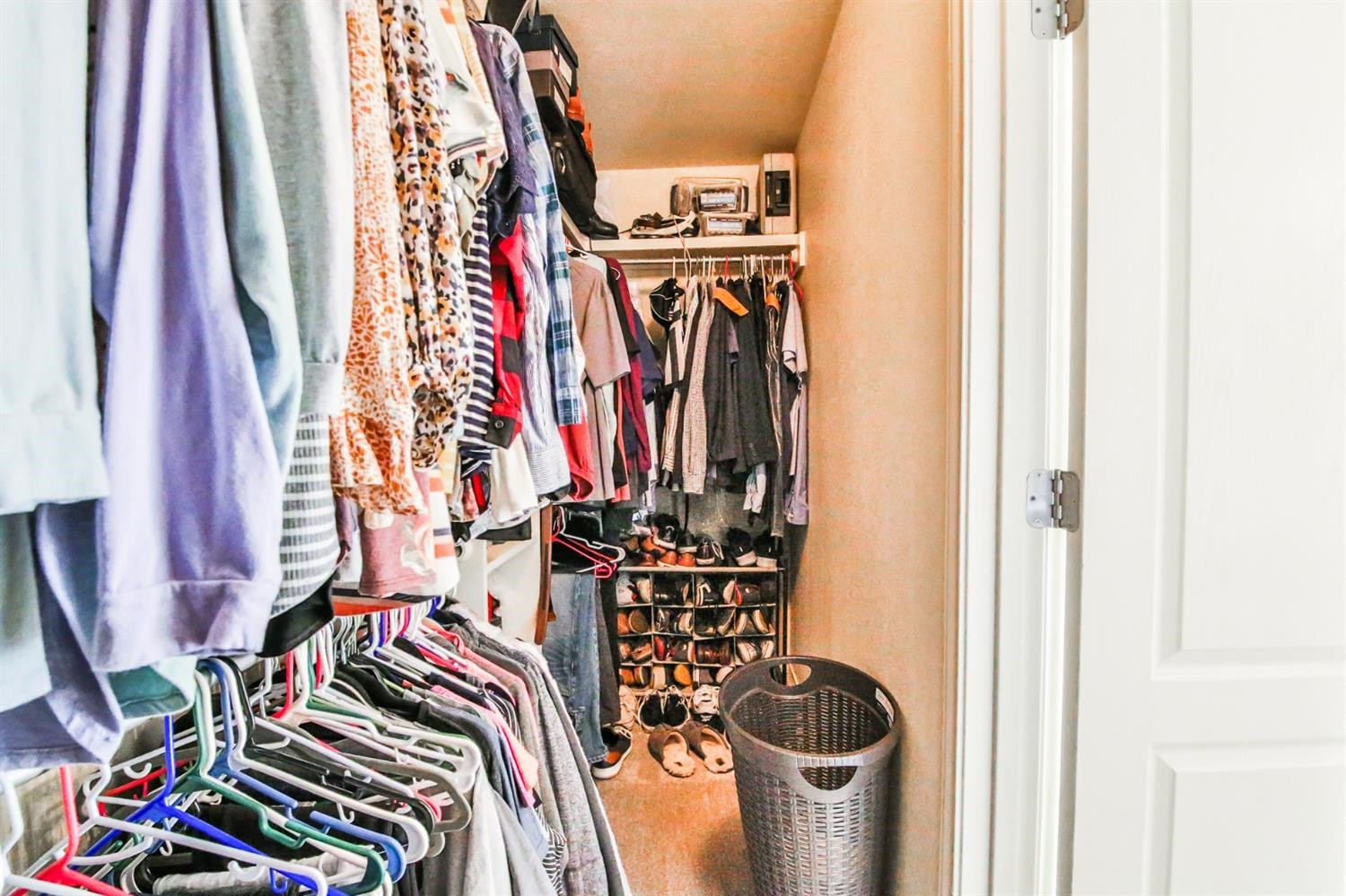 6205 101st Place Lubbock, TX 79424 - Photo 26 of 37 a view of walk in closet with clothes